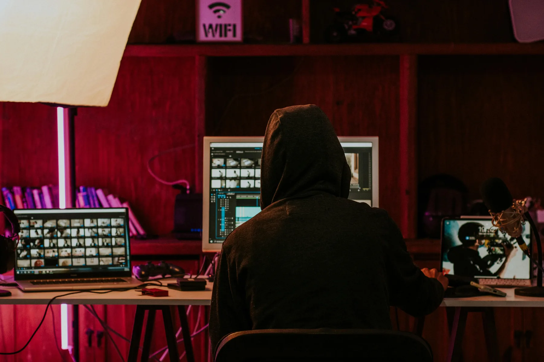 Video editor at a moody editing setup