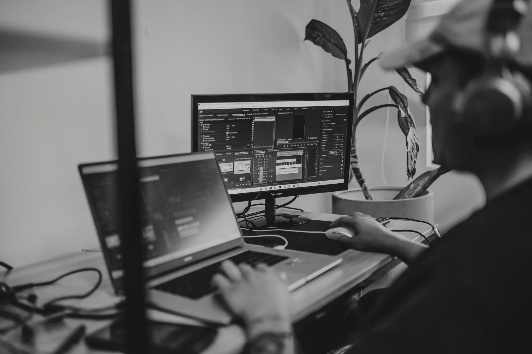 Video editing setup with monitor showing a timeline
