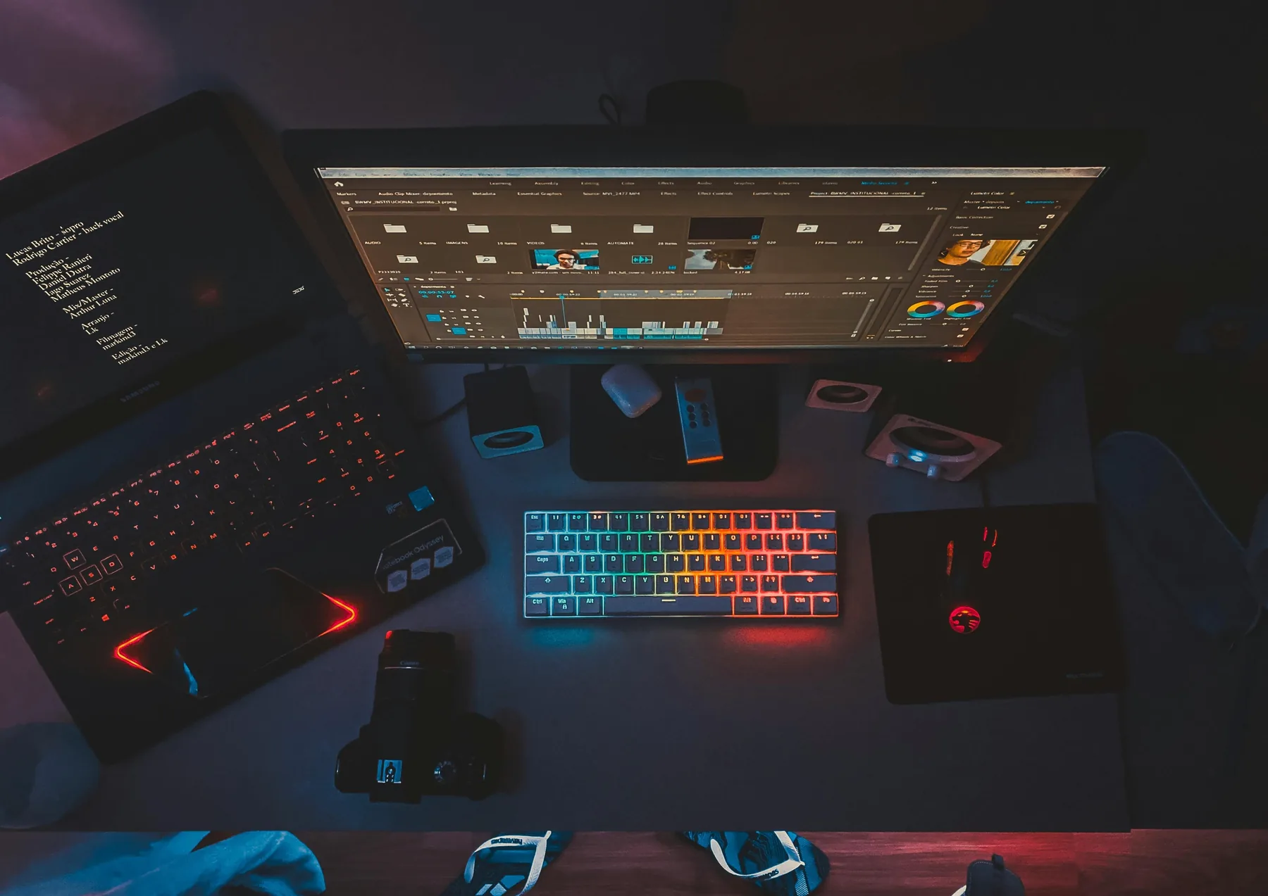 Creator at dual monitor setup browsing social media content